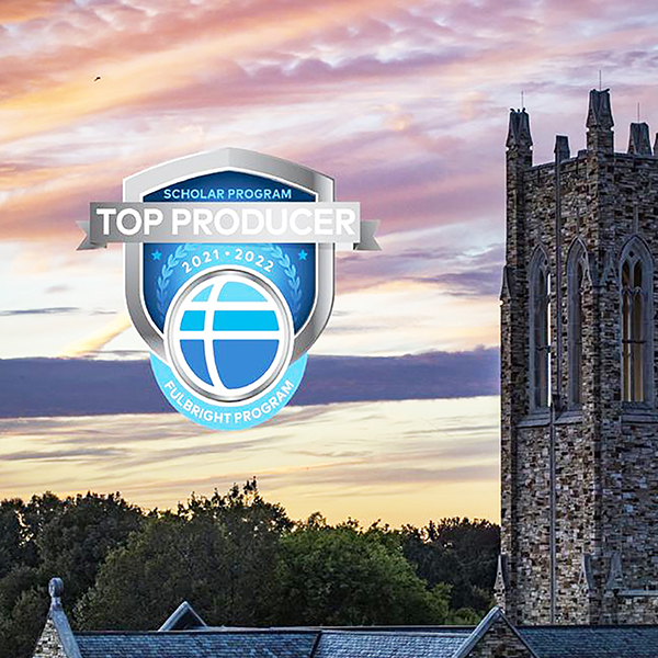 a Gothic tower at sunset with a Fulbright top-producer logo overlaid