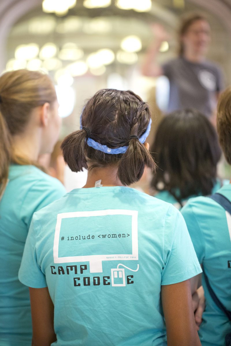 A group of girls, seen from behind, wearing light blue Camp Codette shirts.