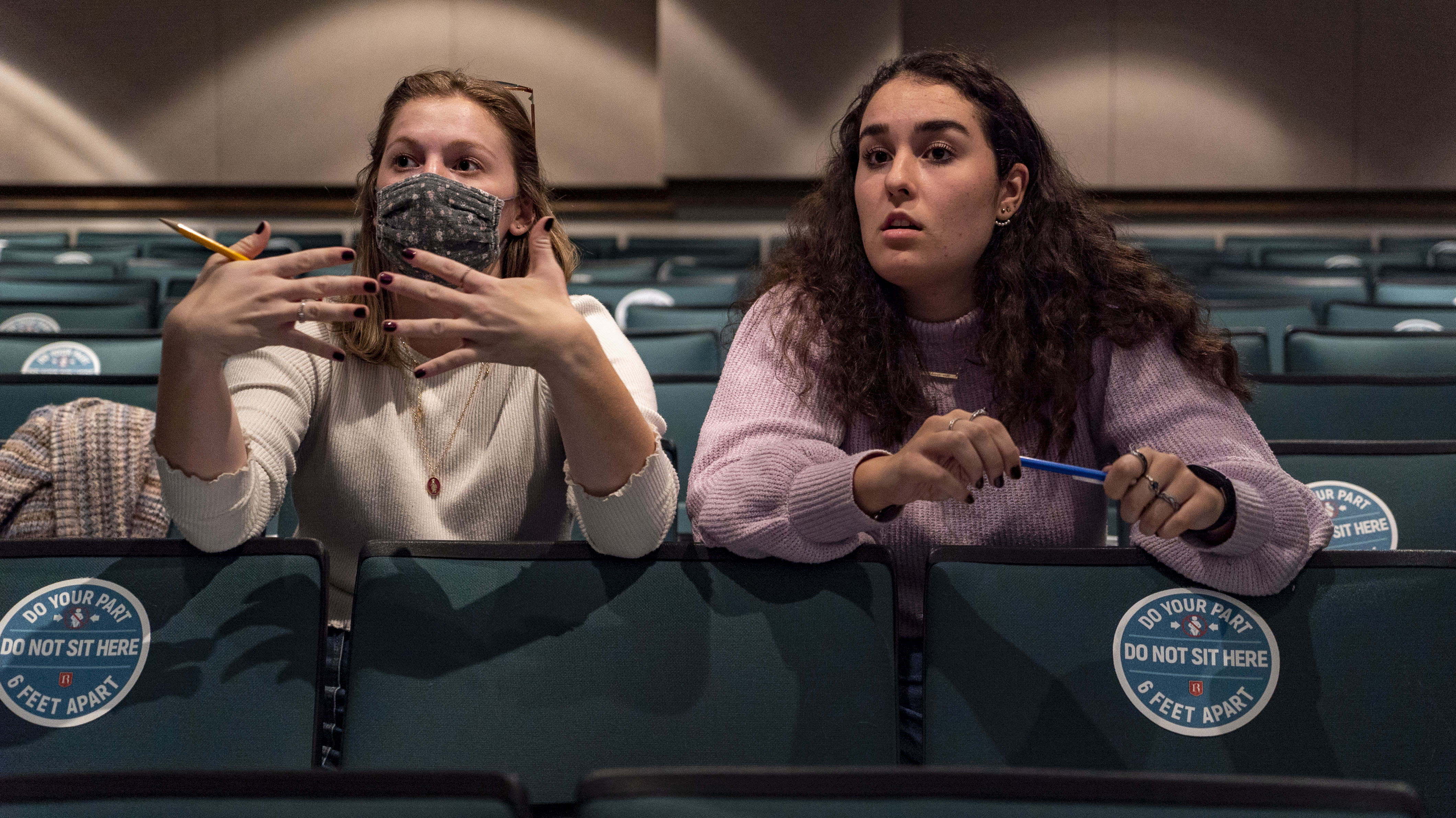 students directing a theater rehearsal