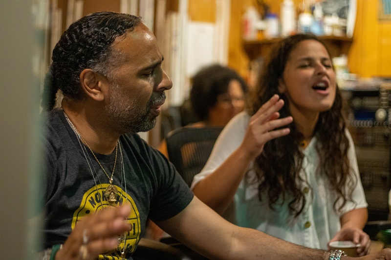 image of Lina Beach singing, sitting next to Boo Mitchell in recording studio