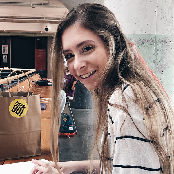 a young woman with long brown hair