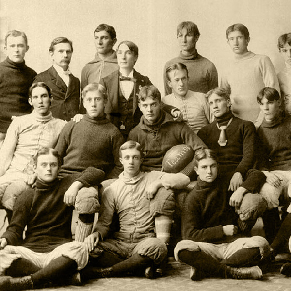 an old-fashioned photo of an early football team