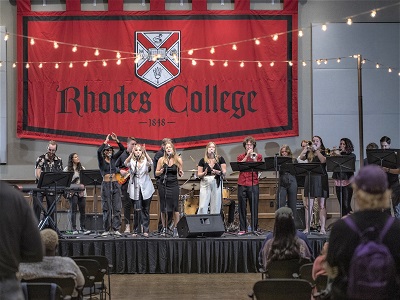 image of performers on stage at a concert at Rhodes College