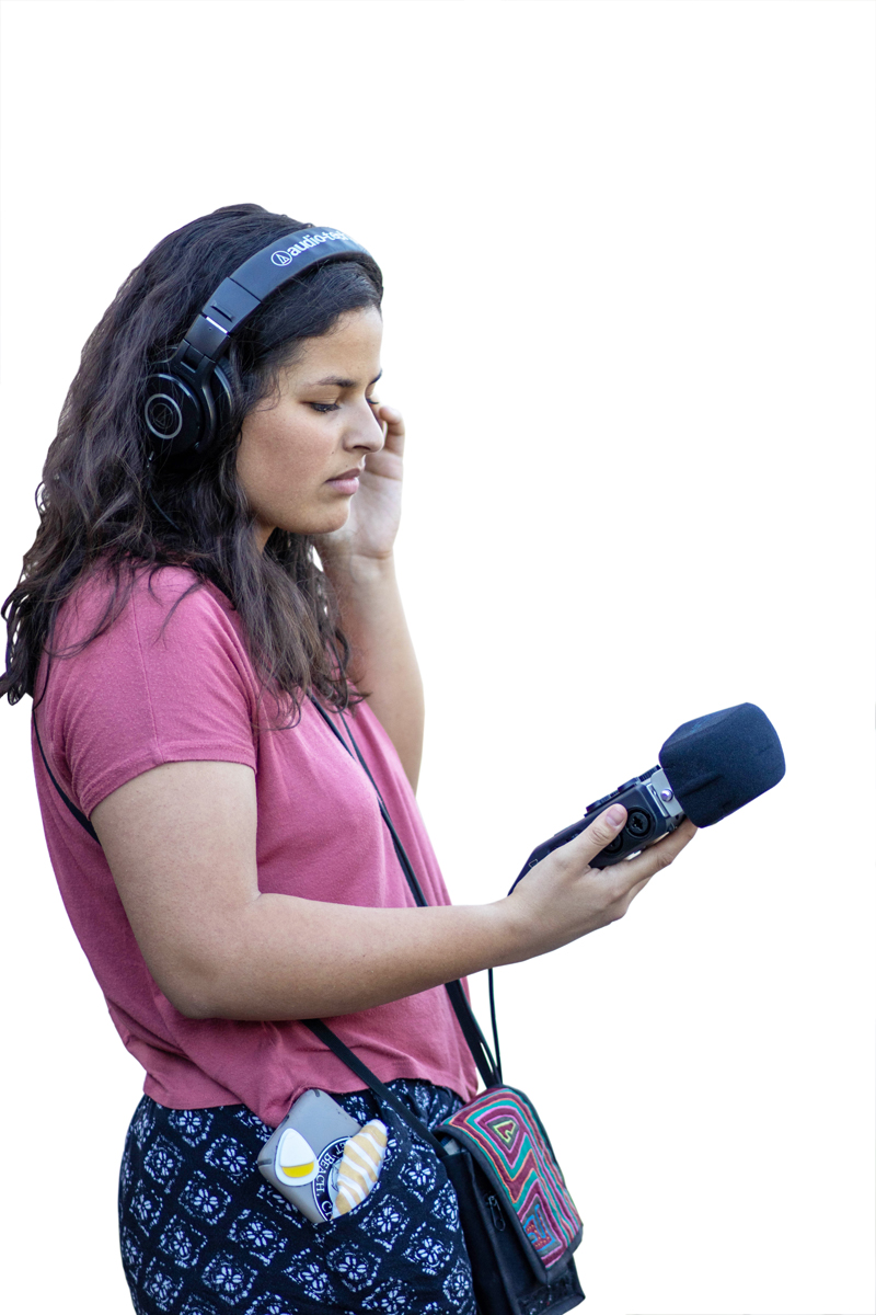 Lina Beach holding a microphone