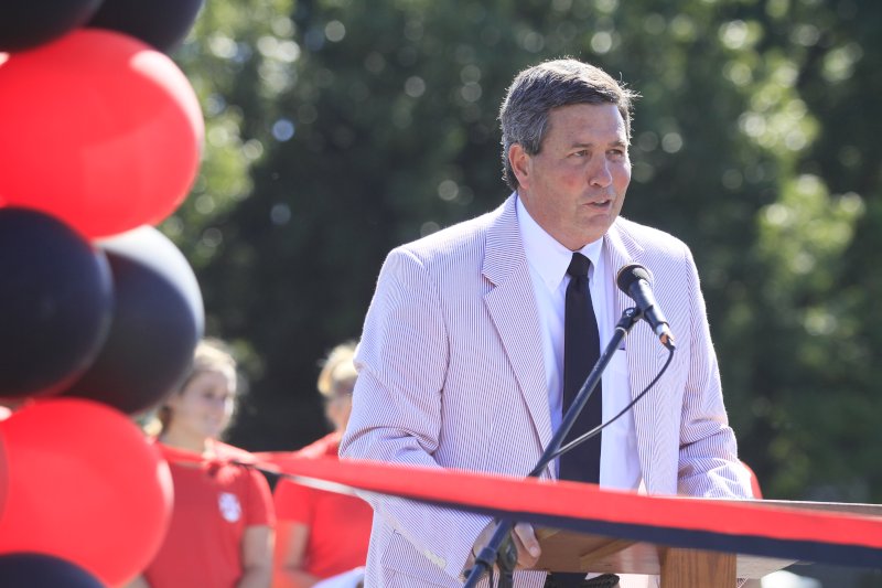 image of Coach Mike Clary at a podium