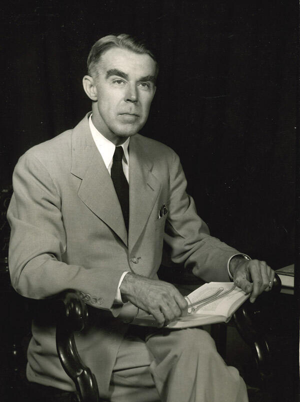 Image of Dr. Peyton N. Rhodes sitting in a chair