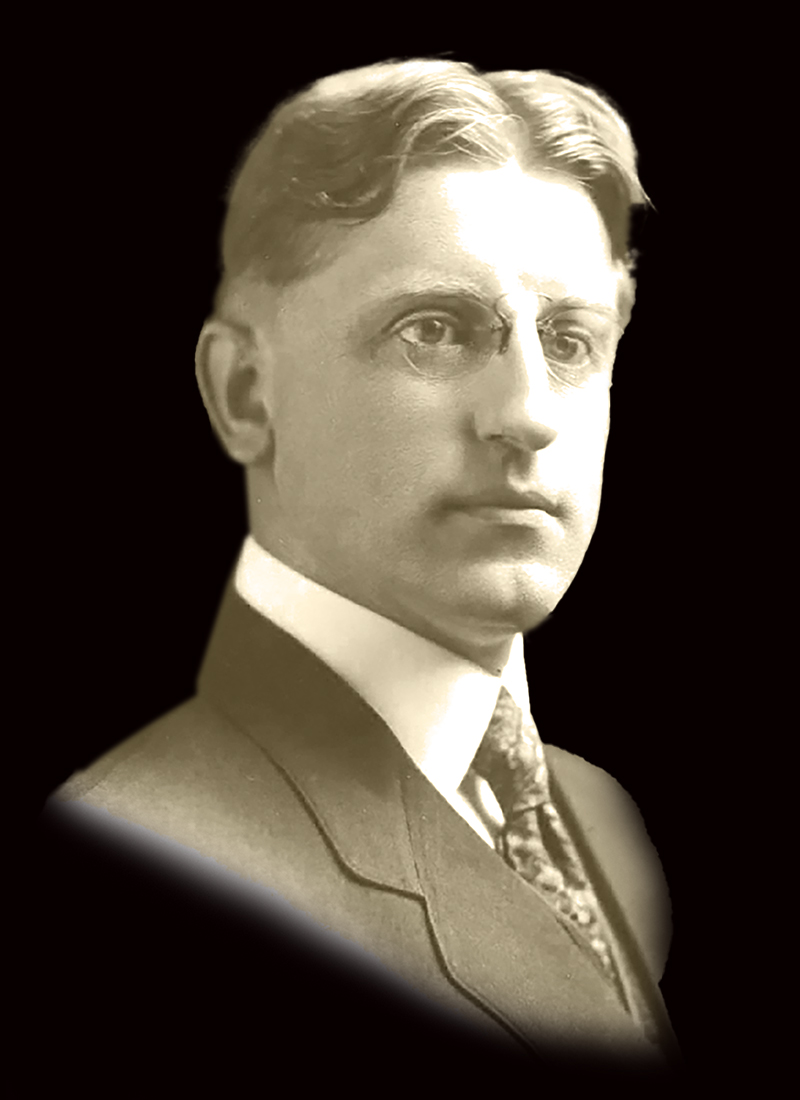 a black and white image of a man in old-fashioned clothes and glasses