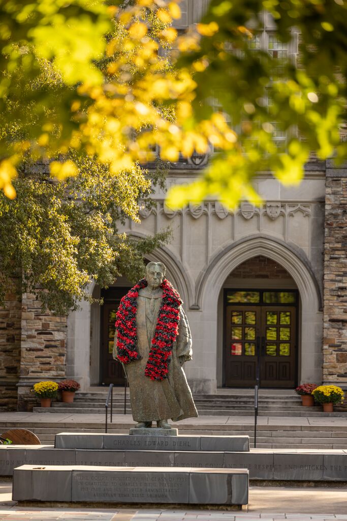 Diehl Statue decorated with red and black