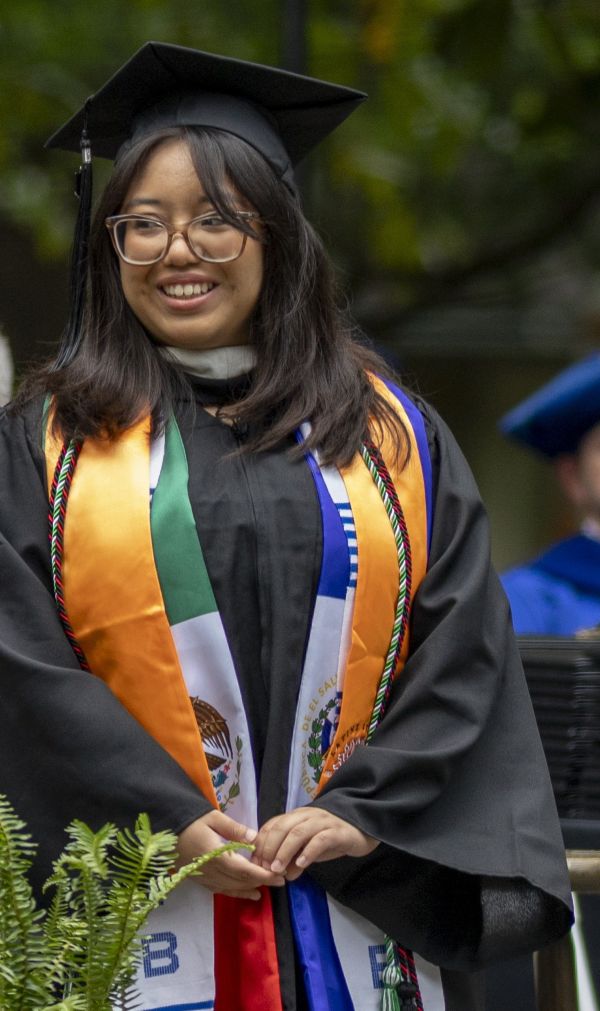 image of graduate Abigail Figueroa in cap and gown
