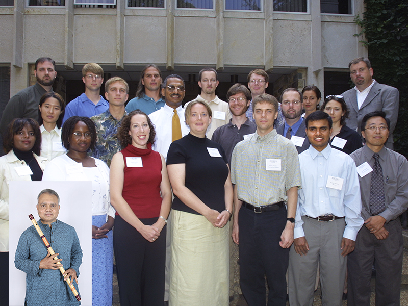 Shubho Banerjee today (inset) and with his 2002 new faculty cohort (second from right, bottom row).