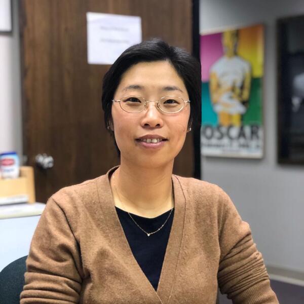 A professor sitting in her office.