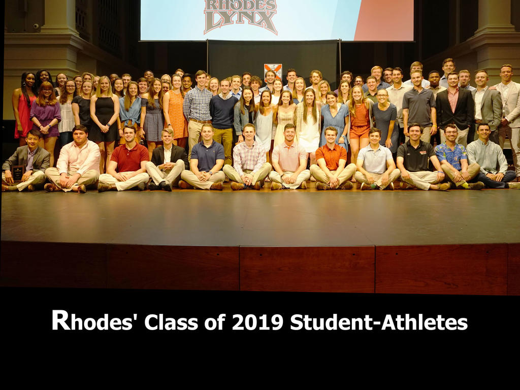 group of student athletes on a stage