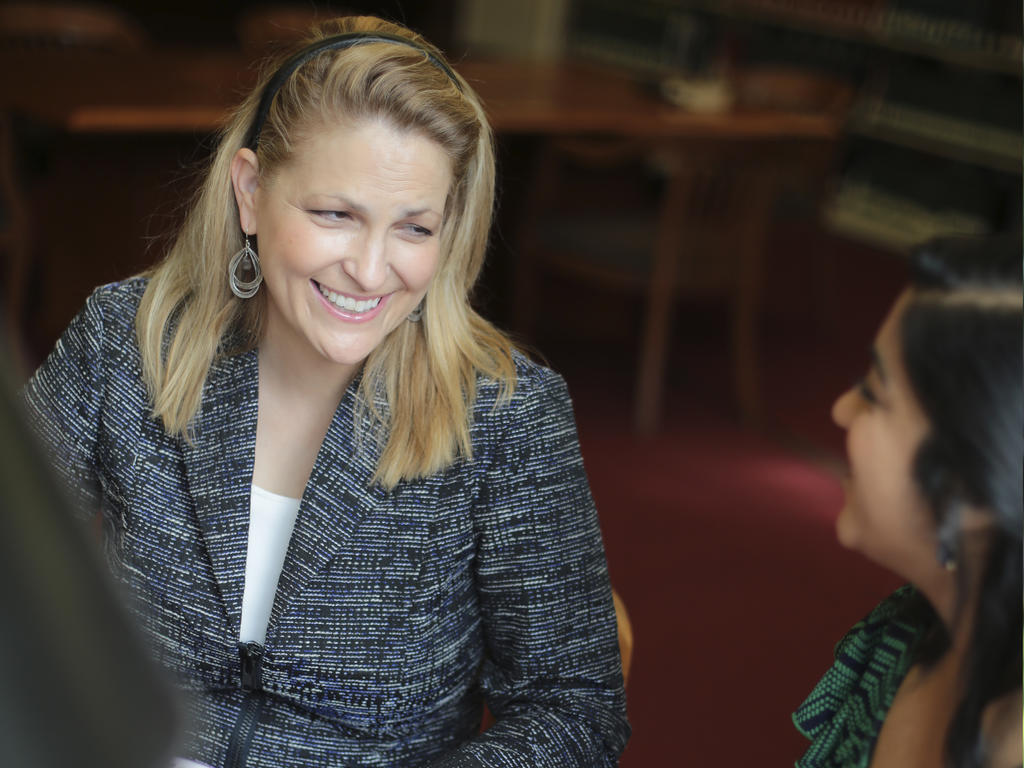 Prof. Amy Jasperson talks with a student