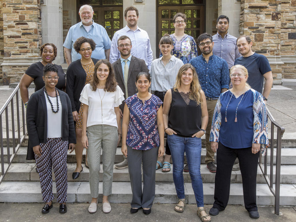 group shot of new faculty on the steps of Burrow Hall