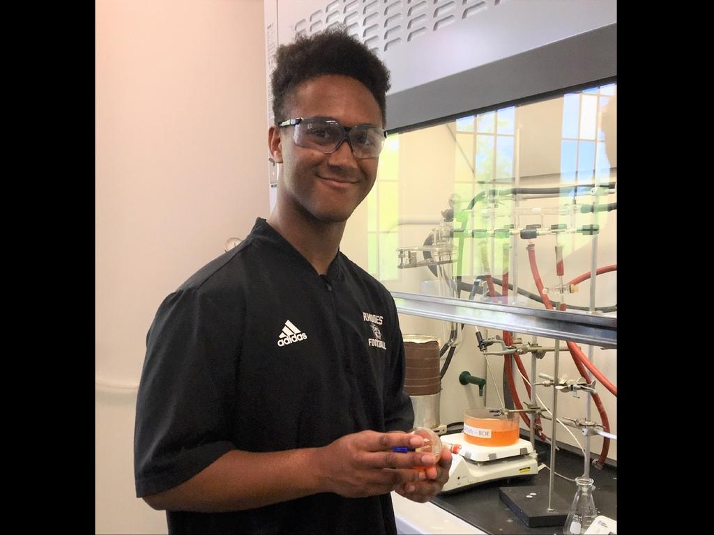 student in a science lab