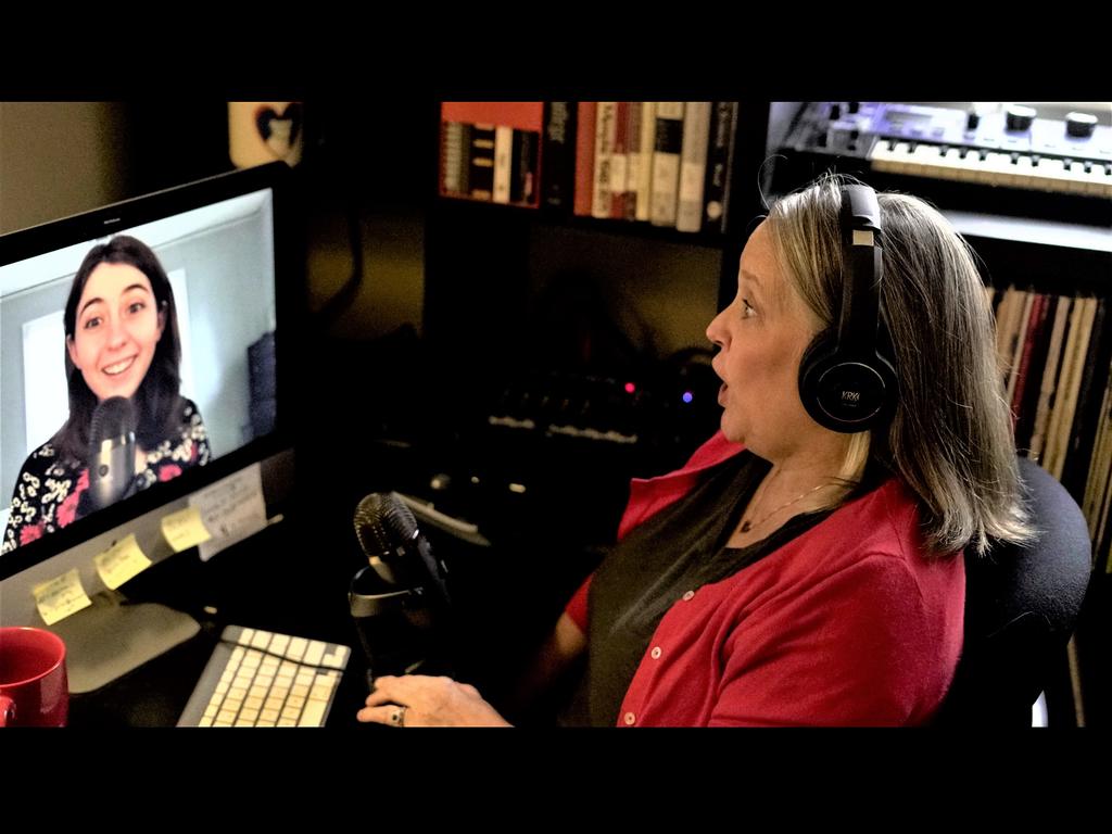 two individuals in a podcast recording session