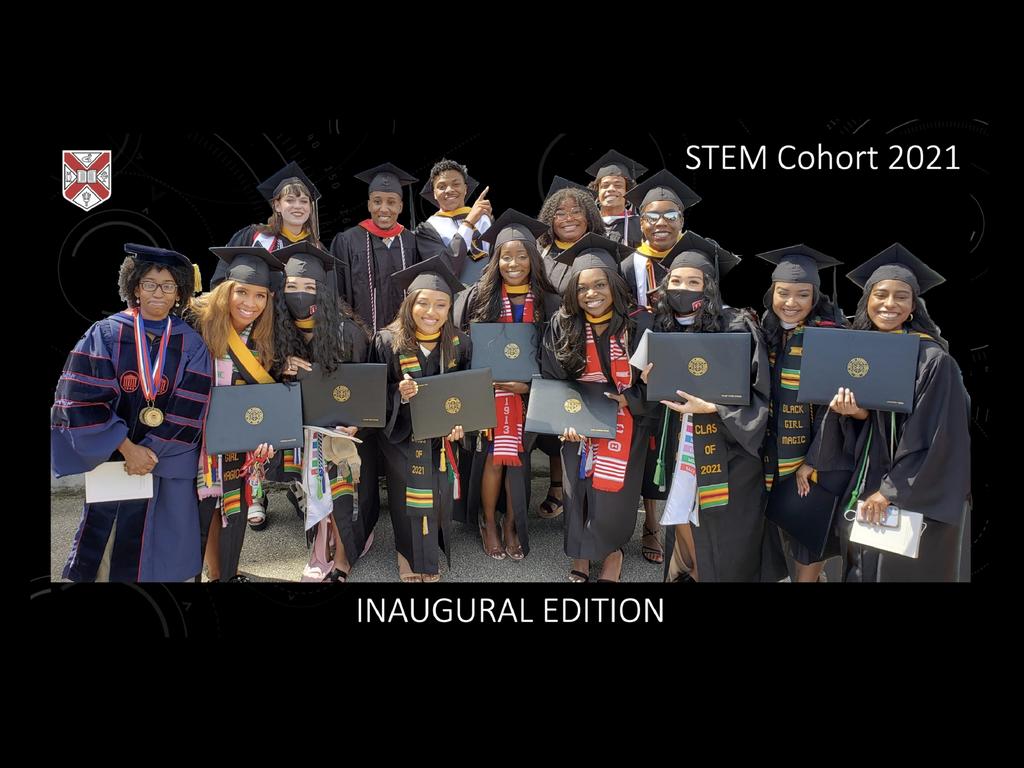 college professor with lab students dress in graduation robes