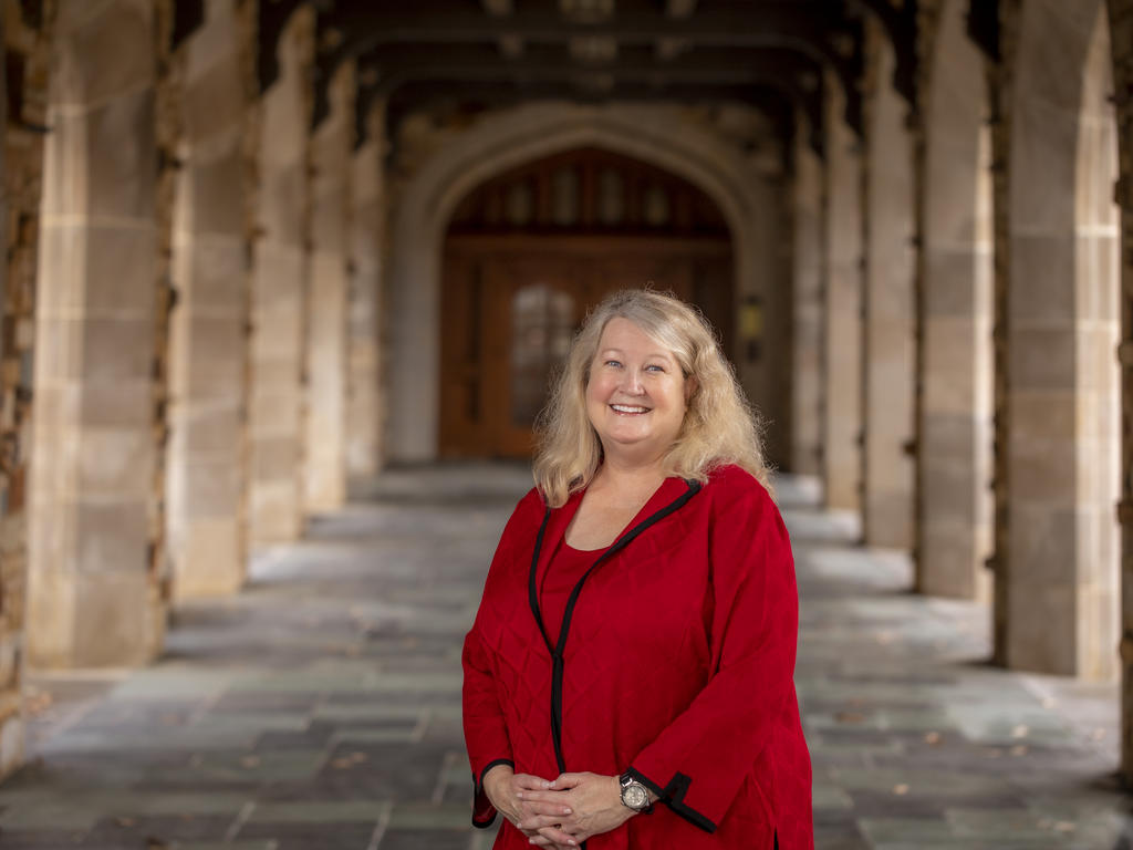 Jennifer M. Collins, president-elect of Rhodes College, stands in the cloister of the Paul Barrett Jr. Library.