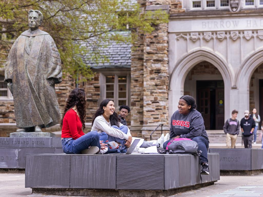 students sitting outside on Rhodes College campus