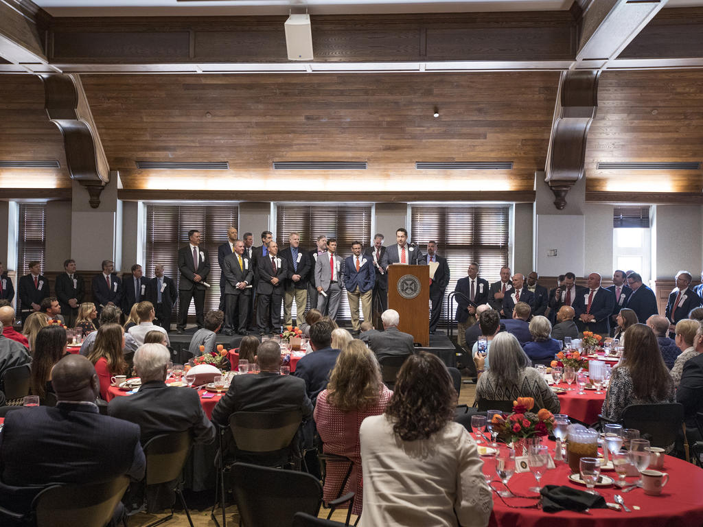 a large banquet with people on stage