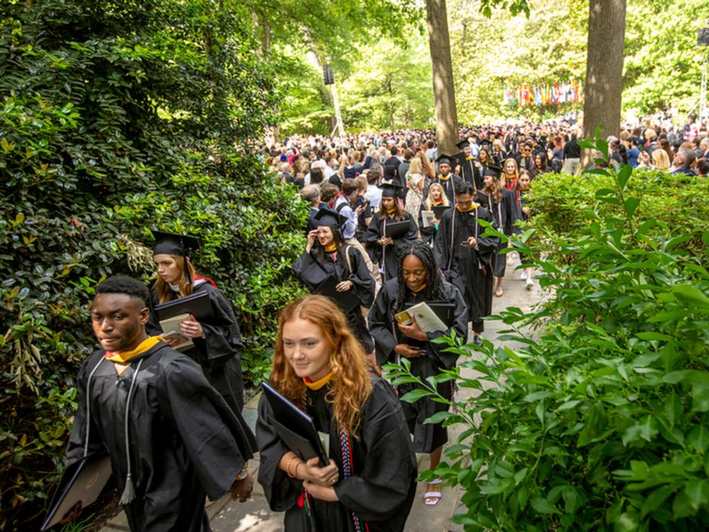 image of Rhodes College graduates in cap and gown
