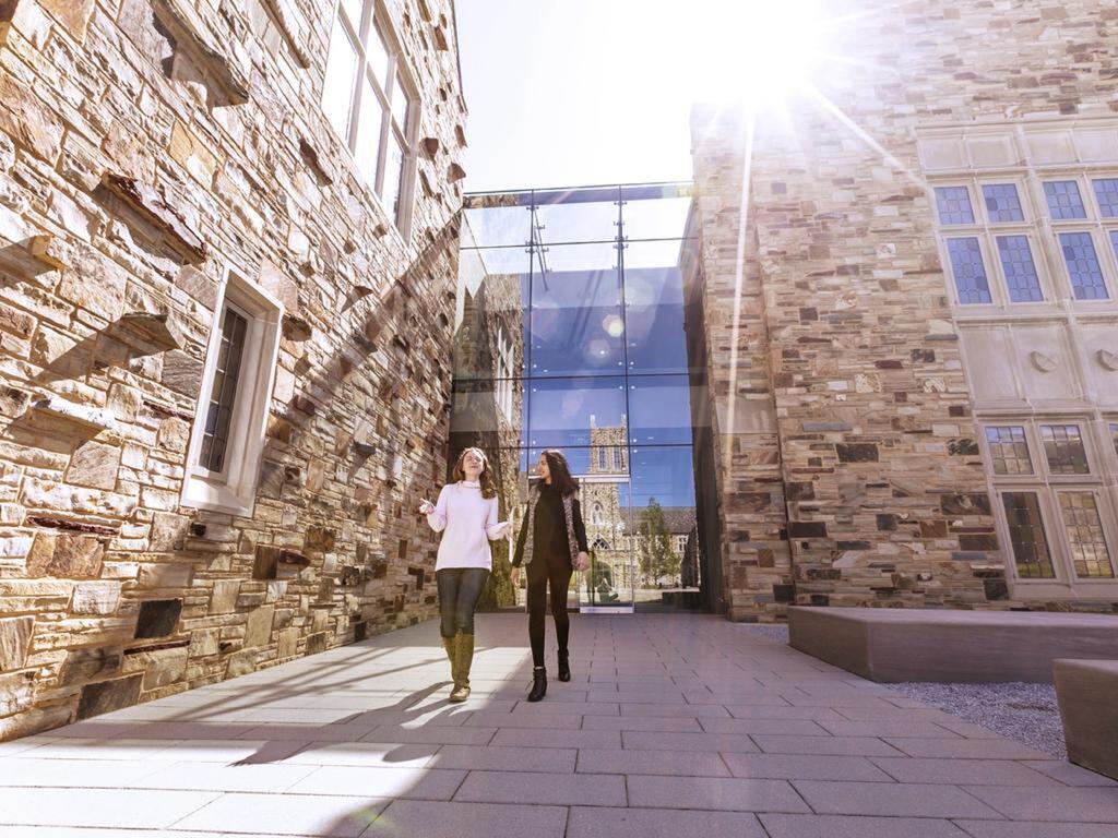 image of two students in front of Robertson Hall at Rhodes College