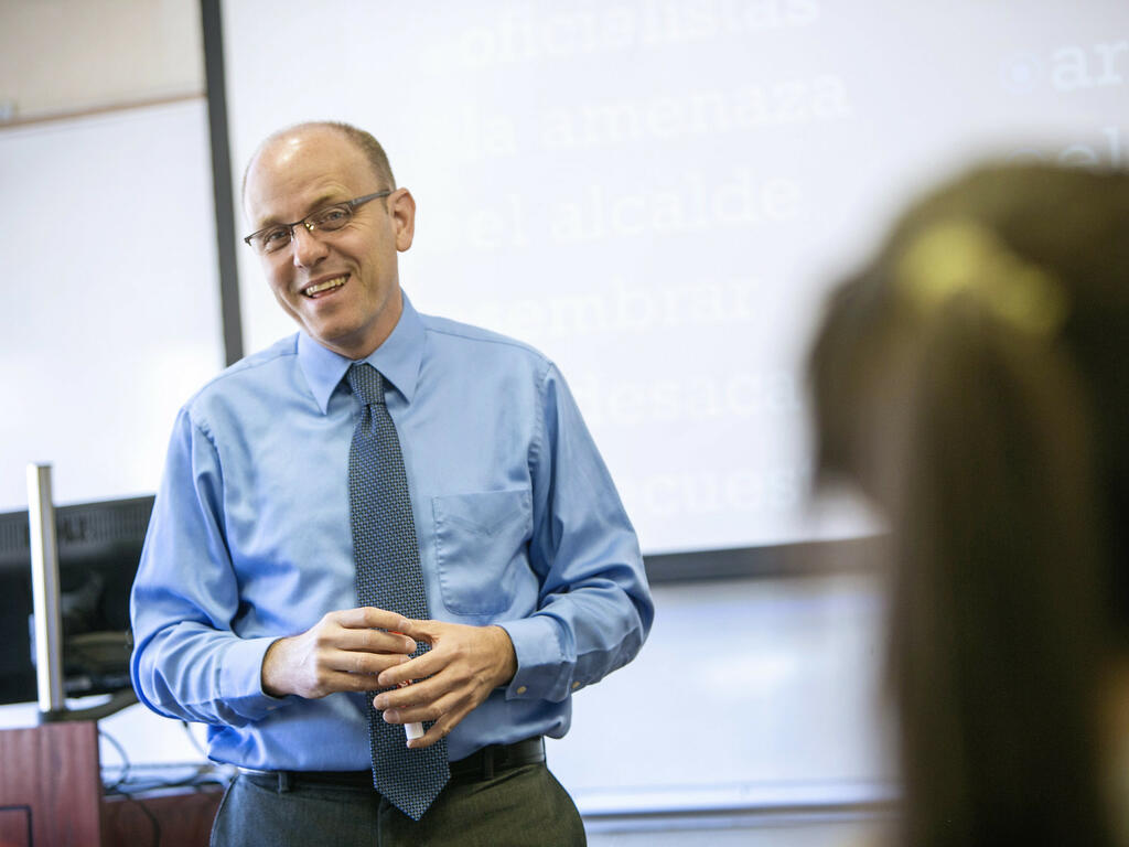 image of Rhodes College professor Eric Henager in the classroom