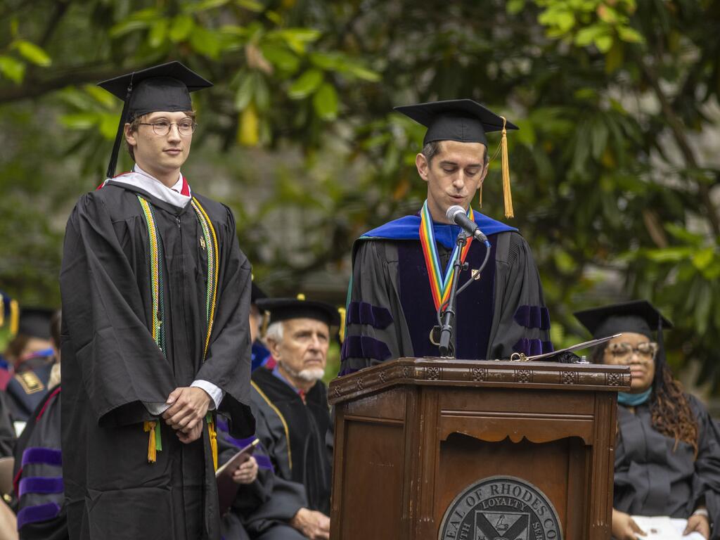 image of Rhodes graduate Walker Coleman receiving his award