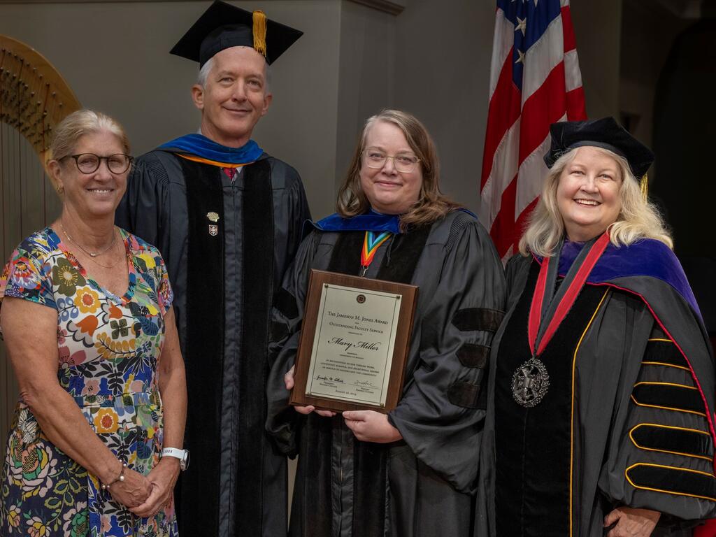 group photo of Mary Miller with Rhodes administrators