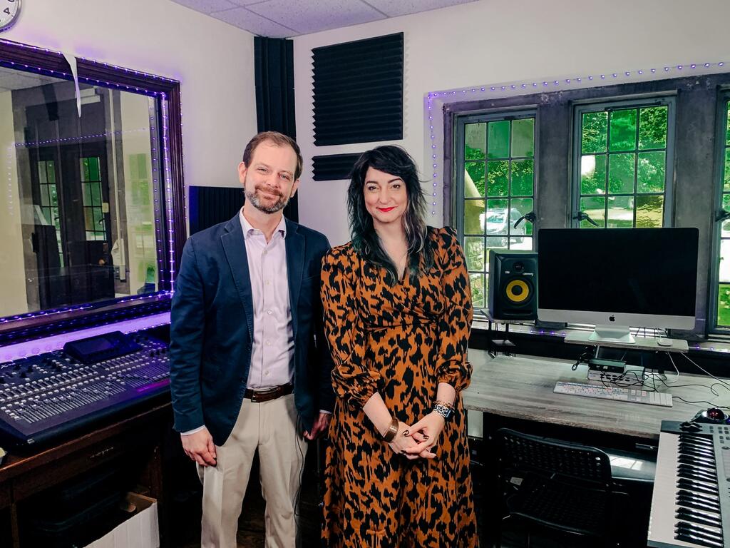 image of John Bass and Stacy Newman in a recording studio