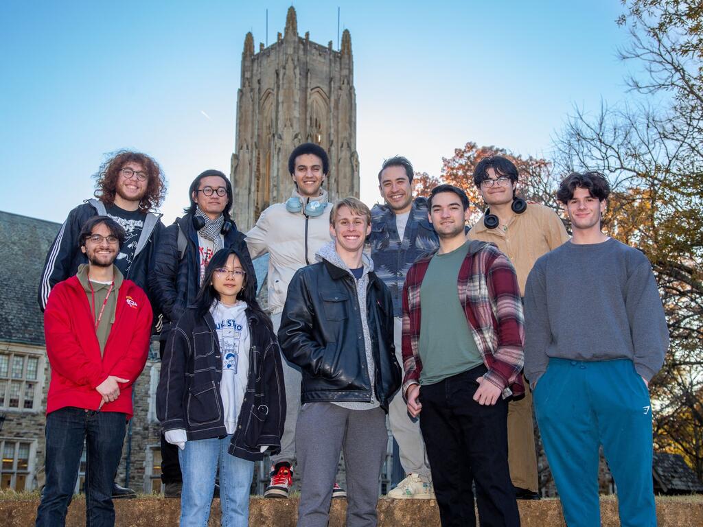 group image of Rhodes CubeSat Team standing outside on Rhodes campus