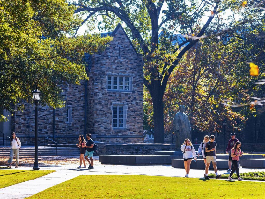 image of Rhodes College students walking on campus