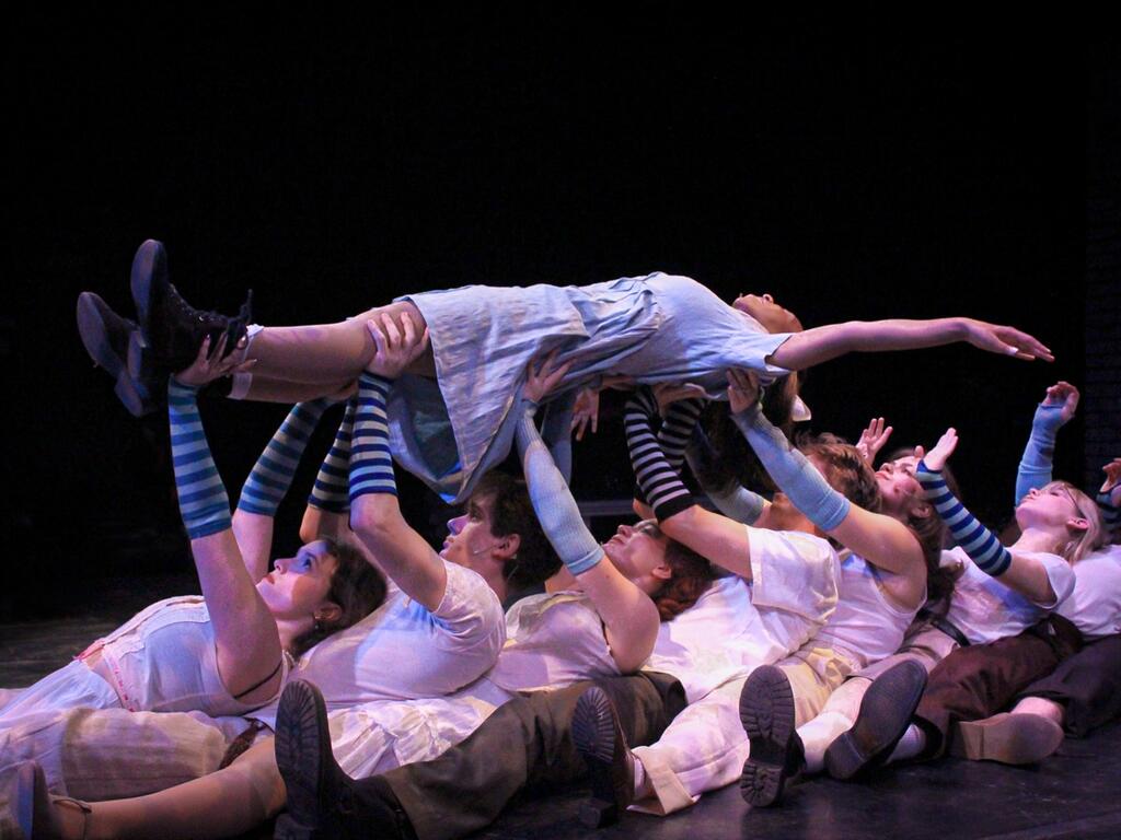 image of Rhodes College actors performing on stage 