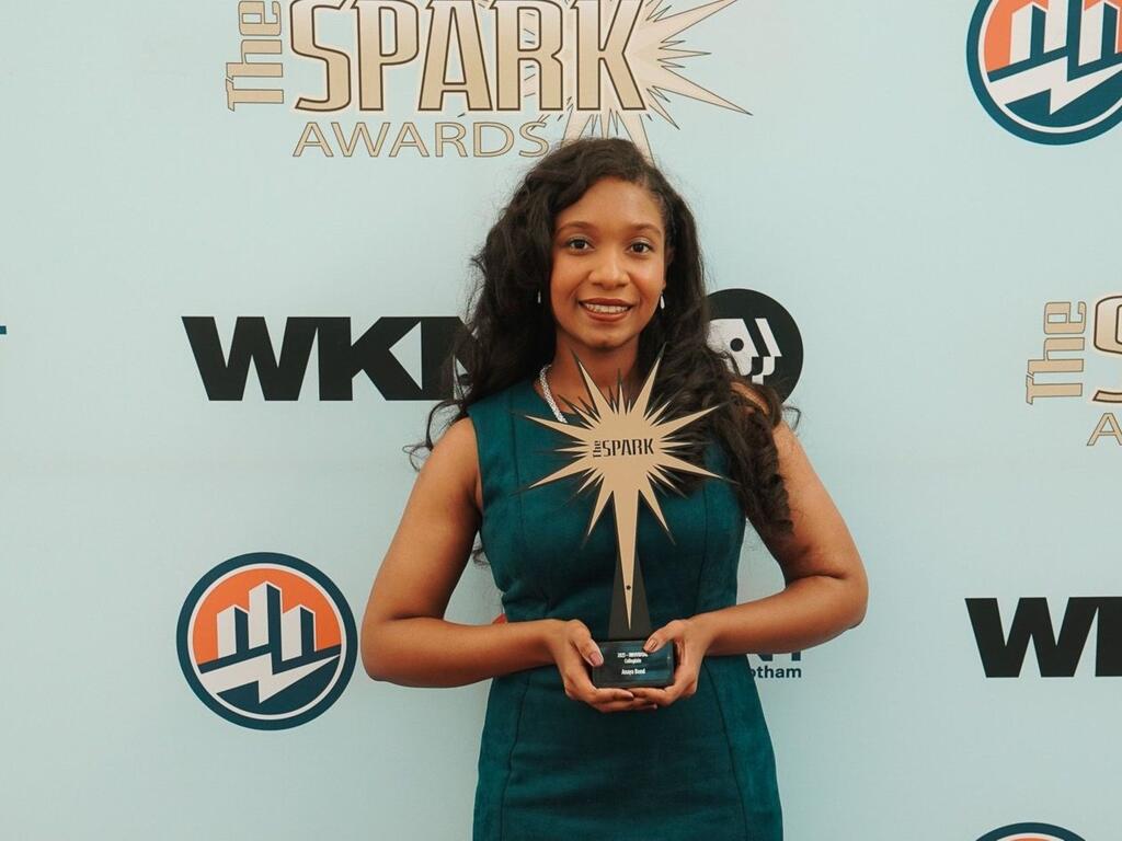 image of Anaya Bond holding a trophy