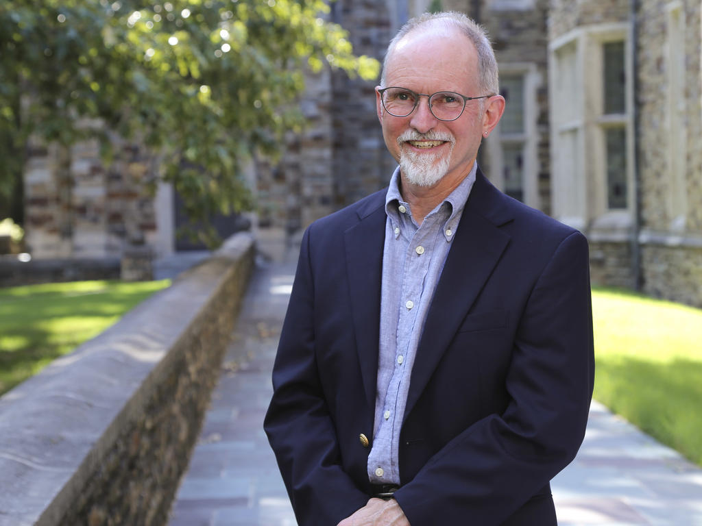 Image of David McCarthy standing outside a Rhodes College building