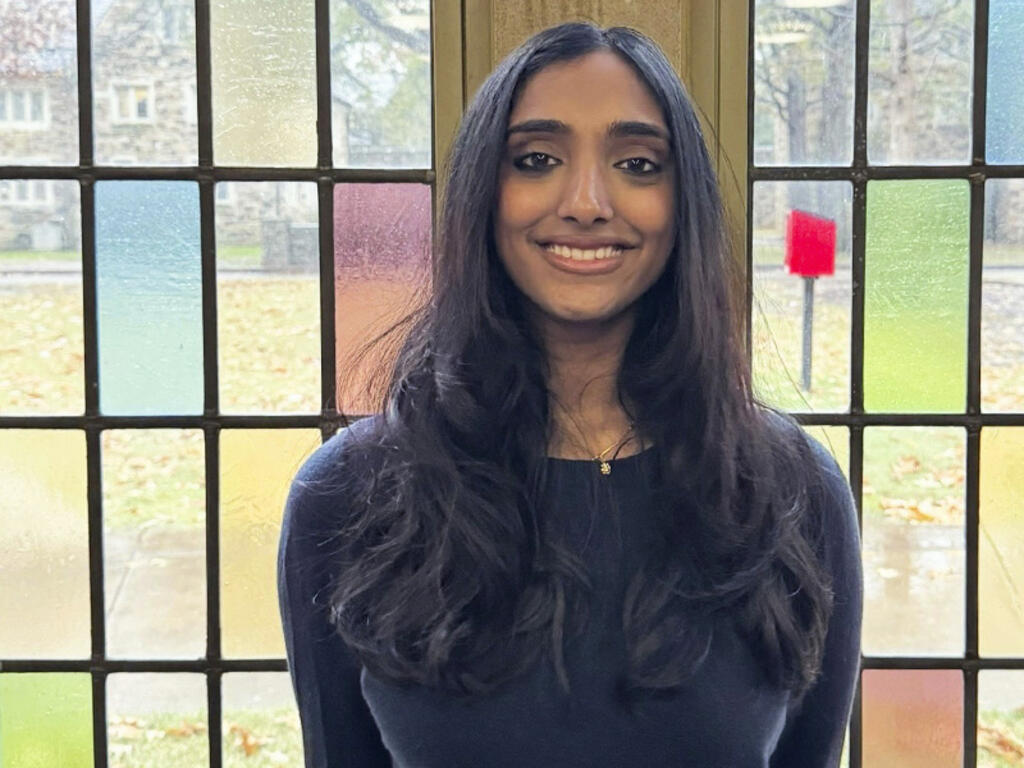 a young woman with long black hair