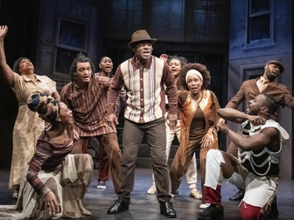 Charles Holt '89 (center) performing in "Don't Bother Me, I Can't Cope."