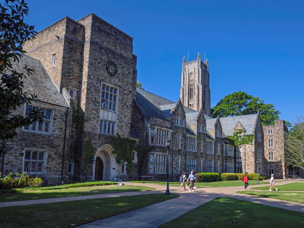image of students walking in front of Rhodes College's Southwestern Hall