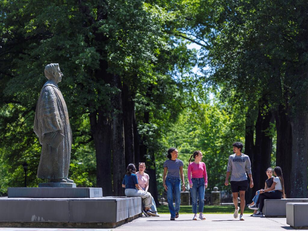 image of Rhodes College students walking across campus