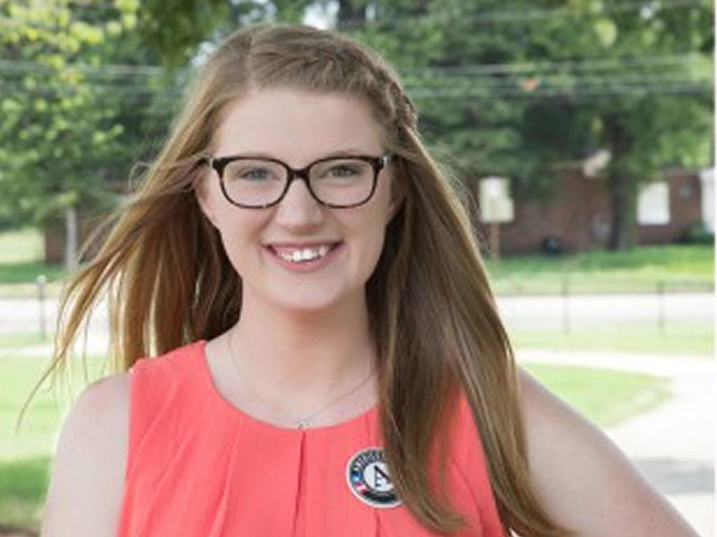 a young white female woman smiling 