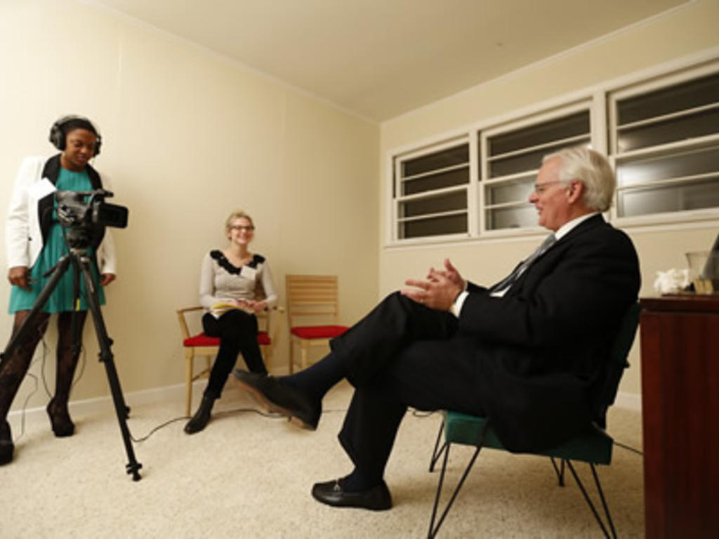 Photo of an interview being digitally recorded.